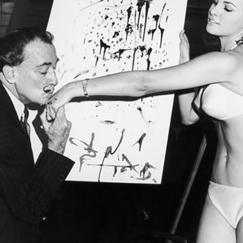 Salvador Dali Kisses The Hand Of Raquel Welch After Finishing His Famous Portrait Of Her, 1965